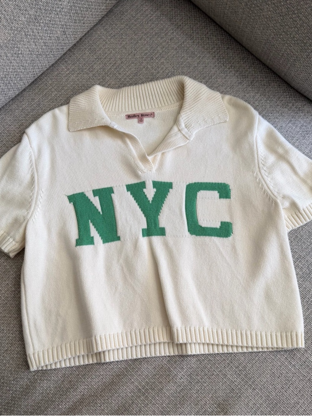 Ivory Polo Sweater with Green NYC Lettering